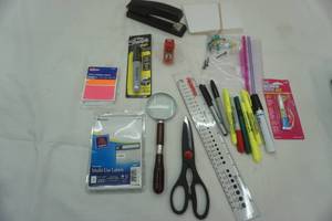 lot 167 image: Office Supply Lot label stickers, staplers, Sharpies, scissors, ruler, magnifying glass, super glue, note cards, and more