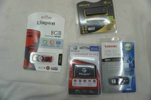 lot 209 image: memory card reader and other USB storage devices. NEW IN BOX