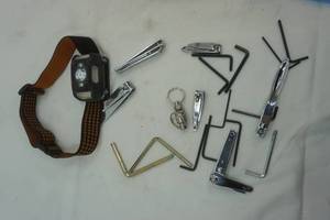 lot 214 image: headlamp lot headlamp, Allen wrenches, keychain, clippers