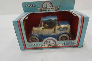 lot 234 image: Ertl. 1918 Ford Runabout. 125 scale. locking coin bank.