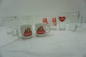 lot 269 image: Coca Cola and Diet Coke glasses and ceramic mug set