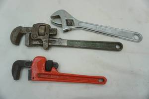 lot 375 image: large pipe wrenches & a crescent wrench
