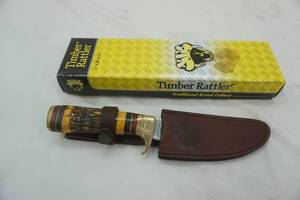 lot 404 image: Timber Rattler knife and leather sheath