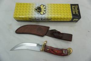lot 406 image: Timber Rattler knife and leather sheath
