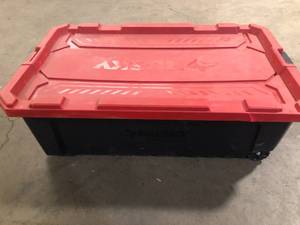 lot 10 image: Husky 57 Gal. Pro Grip Storage Tote with Wheels in Black with Red Lid Customer Returns See Pictures