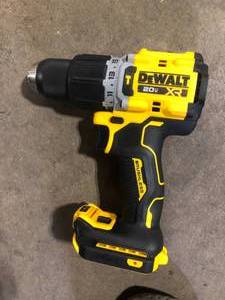 lot 15 image: DEWALT 20V Compact Cordless 12 in. Hammer Drill (Tool Only) Customer Returns See Pictures