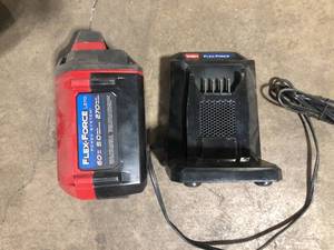 lot 26 image: Toro  Battery and Charger Customer Returns See Pictures