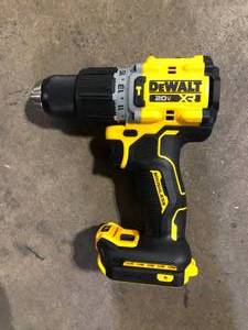 lot 30 image: DEWALT 20V Compact Cordless 12 in. Hammer Drill (Tool Only)   Customer Returns See Pictures