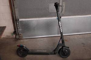 lot 332 image: GoTrax Electric Scooter