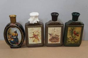 lot 43 image: 4 Vintage Jim Beams Choice Decanters