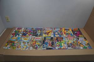 lot 79 image: 14 Vintage Justice League International Comic Books