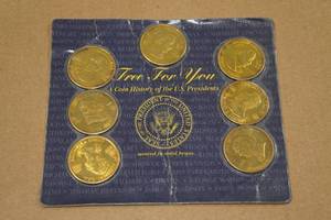 lot 105 image: A Coin History of the US Presidents Minted in Solid Brass