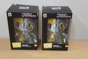lot 145 image: 2 DZNR Transformers Collectable Plush Toys