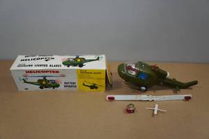 lot 146 image: Battery Operated Helicopter with Whirling Lighted Blades