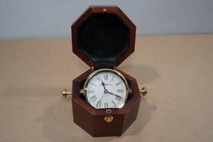 lot 201 image: Howard Miller Octagon Box Nautical Clock