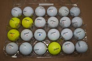 lot 235 image: 24 Titleist Golf Balls