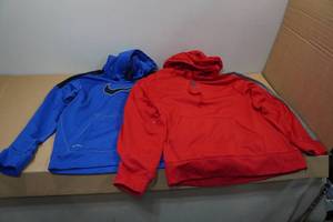lot 243 image: 2 Hoodies - Nike, Champion