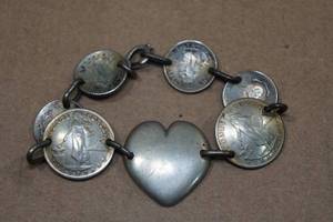 lot 280 image: Cupped Philippines Coin Bracelet