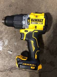 lot 1 image: DEWALT 20V Compact Cordless 12 in. Hammer Drill (Tool Only)  Customer Returns See Pictures