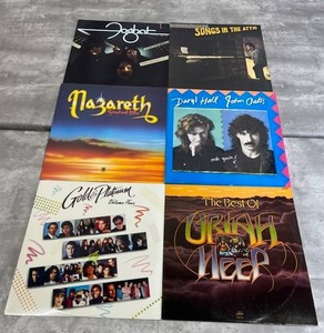 lot 13 image: Vinyl LP Lot - NazarethFoghatBilly JoelHall & Oates (New Sealed)Uriah HeepGold & Platinum Volume Four in Used Condition