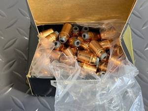 lot 32 image: Nosler .44 Caliber 300 Grain Hollow Point Copper Plated Bullets (3 Pounds)