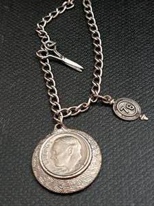 Bracelet with a 1977 Roosevelt Dime...