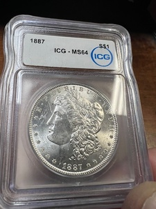 lot 10 image: 1887 Morgan MS-64 Graded