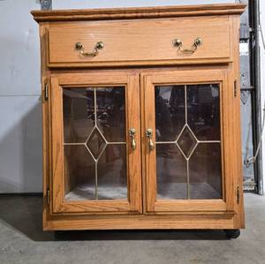 lot 51 image: Vintage Oak Nightstand with Glass Doors and Drawer