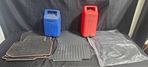 lot 29 image: Set of 5 Automotive Floor Mats & Coleman Propane Lantern Cases