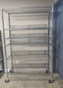 lot 31 image: Heavy-Duty Metal Wire Storage Rack with 5 Shelves and Wheels