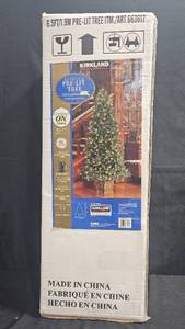 lot 47 image: Kirkland Signature 6.5 ft Pre-Lit Christmas Tree with 350 Constant On Lights
