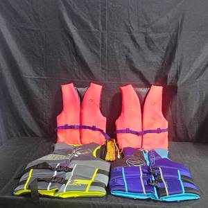 lot 62 image: Set of 4 Life Jackets - Stearns and Hyperlite Brands