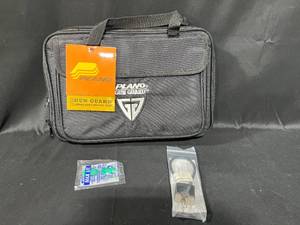 lot 213 image: Plano Gun Guard Large Soft Pistol Case with Accessories