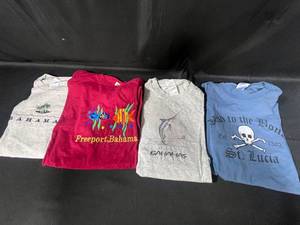 lot 74 image: Lot of 4 Mens T-Shirts Featuring Bahamas & St. Lucia Designs