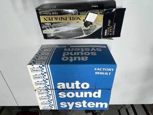lot 150 image: Auto Sound System - In-Dash AMFM Cassette with Speakers and Accessories - Factory Rebuilt