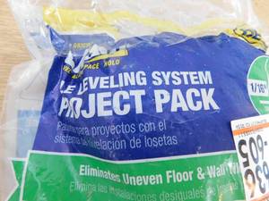 lot 45 image: QEP LASH Tile Leveling System Project Pack - 100 116 in. Leveling Clips and 100 Wedges (200-Piece)