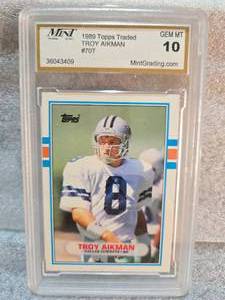 lot 175 image: Mint Gem 10 1989 Topps Traded Troy Aikman Rookie #70T