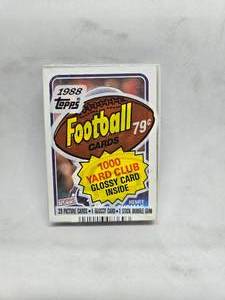 lot 220 image: 1988 Topps Football Cello Pack with Henry Thomas Rookie on Top