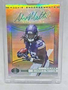lot 229 image: 2019 Illusions Rookie Edorsement Emerald Alexander Mattison Rookie Serial #910