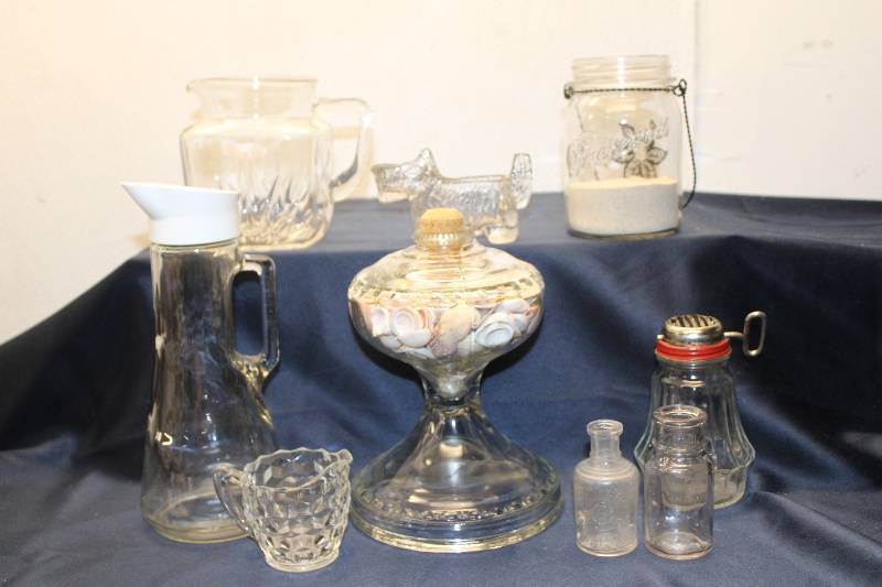 lot Y-119 image: Collection of Vintage Glassware including Pitchers, Canister, and Decorative Items