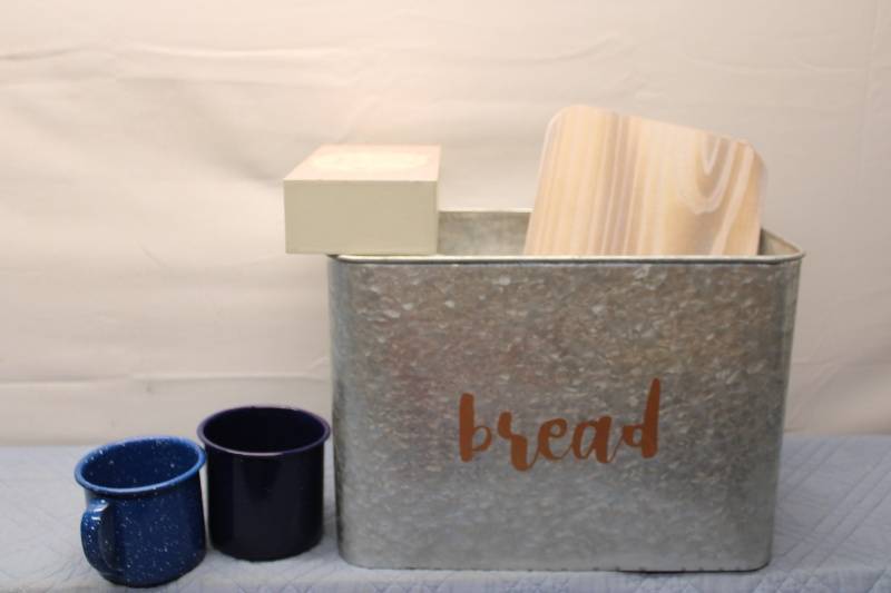 lot Y-241 image: Rustic Kitchen Collection Bread Box, Wooden Cutting Board, and Two Enamel Mugs