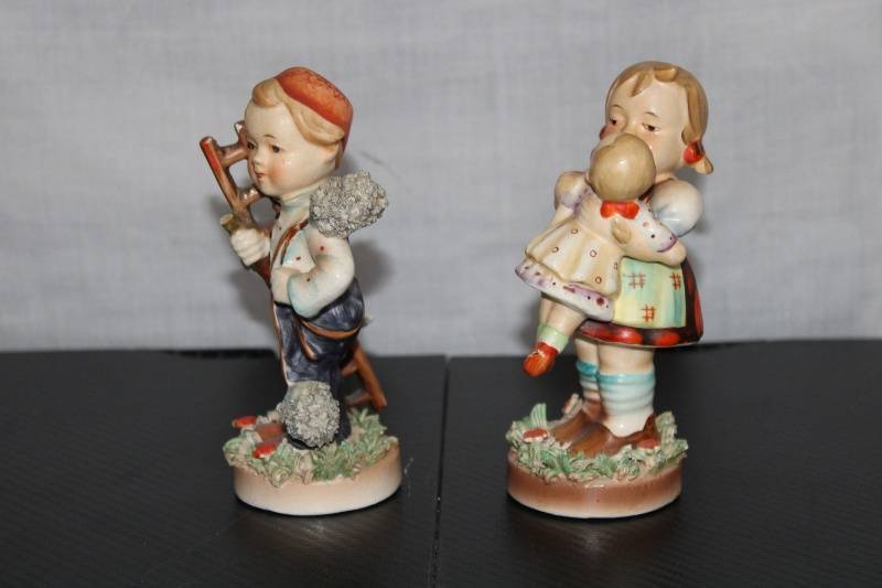 lot P-380 image: Set of 2 Vintage Hummel Figurines - Chimney Sweeper & Girl Holding Doll