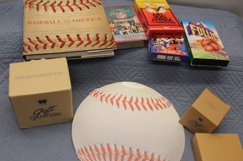 lot P-55 image: Baseball and Football Collectibles Lot - VHS Tapes, Memorabilia, and More