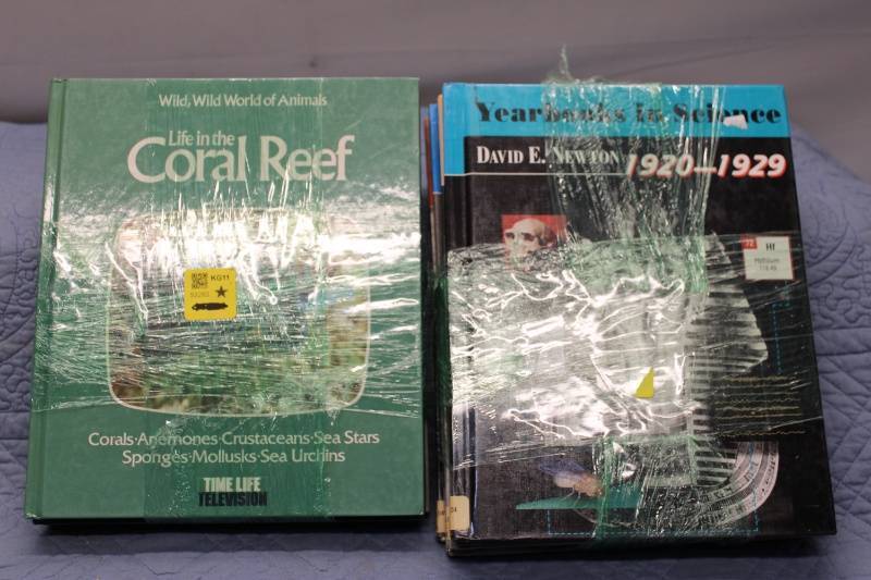 lot P-204 image: Collection of 7 Science and Animal Books including Yearbooks in Science and Life in the Coral Reef