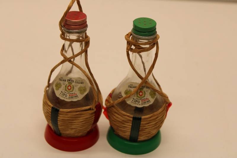 lot 517 image: Set of 2 Vintage Italian Swiss Colon Condiment Bottles with Woven Baskets