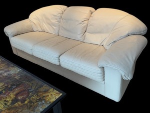 lot 102 image: Luxurious Cream Colored Leather Sofa