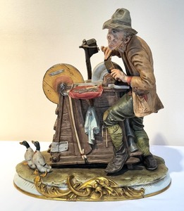 lot 79 image: Capodimonte Unique Knife Sharpener Porcelain Sculpture Signed