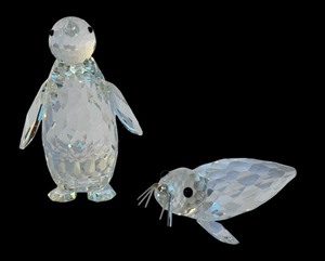lot 239 image: Swarovski Crystal Penguin and Seal Figurines