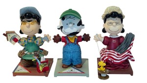 lot 359A image: Three Peanuts Collectible Figurines including Lucy Ross No. 8753
