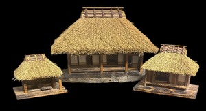 lot 262 image: Three Vintage Decorative Hut Figurines